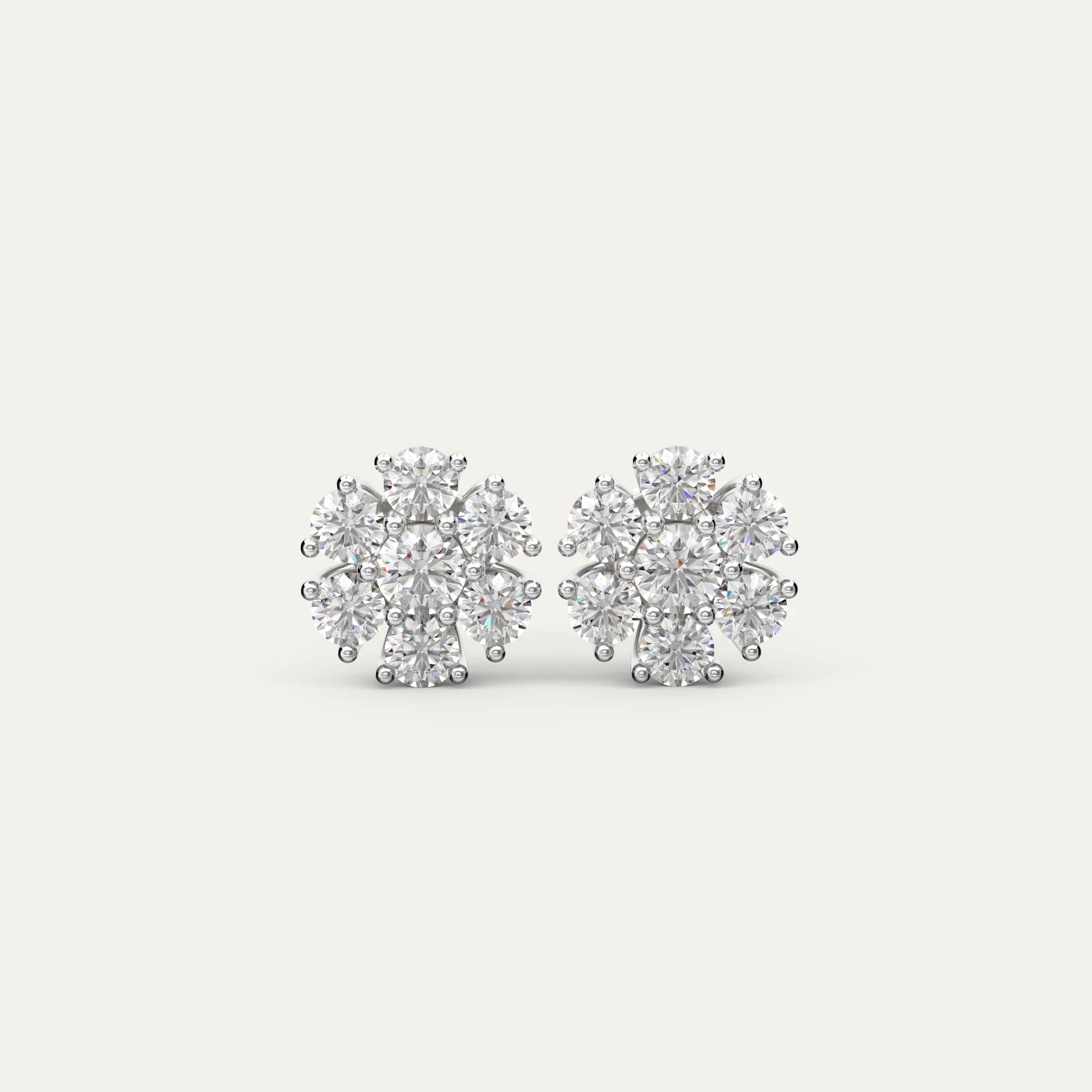 Goldmacher Calytrix sterling silver cluster earrings with round moissanite stones in a floral design