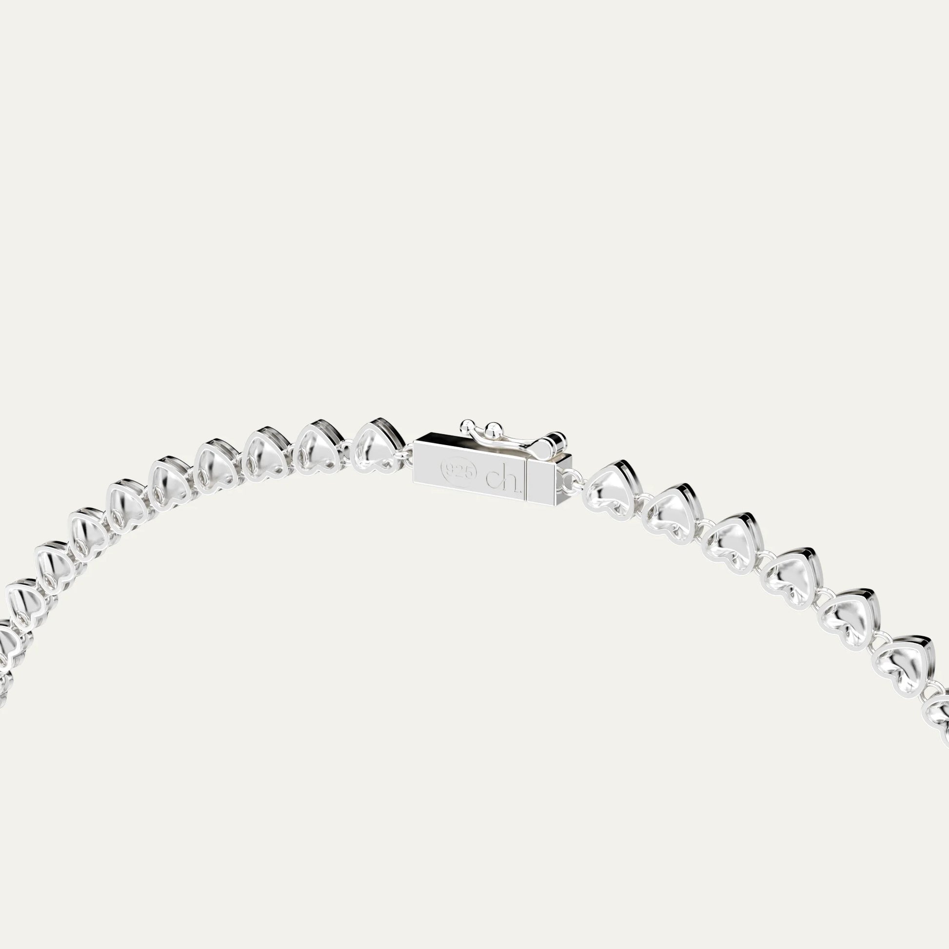 Rhodium Silver Heart String Necklace – Close-Up of Heart Links, Box Clasp and S925 Logo