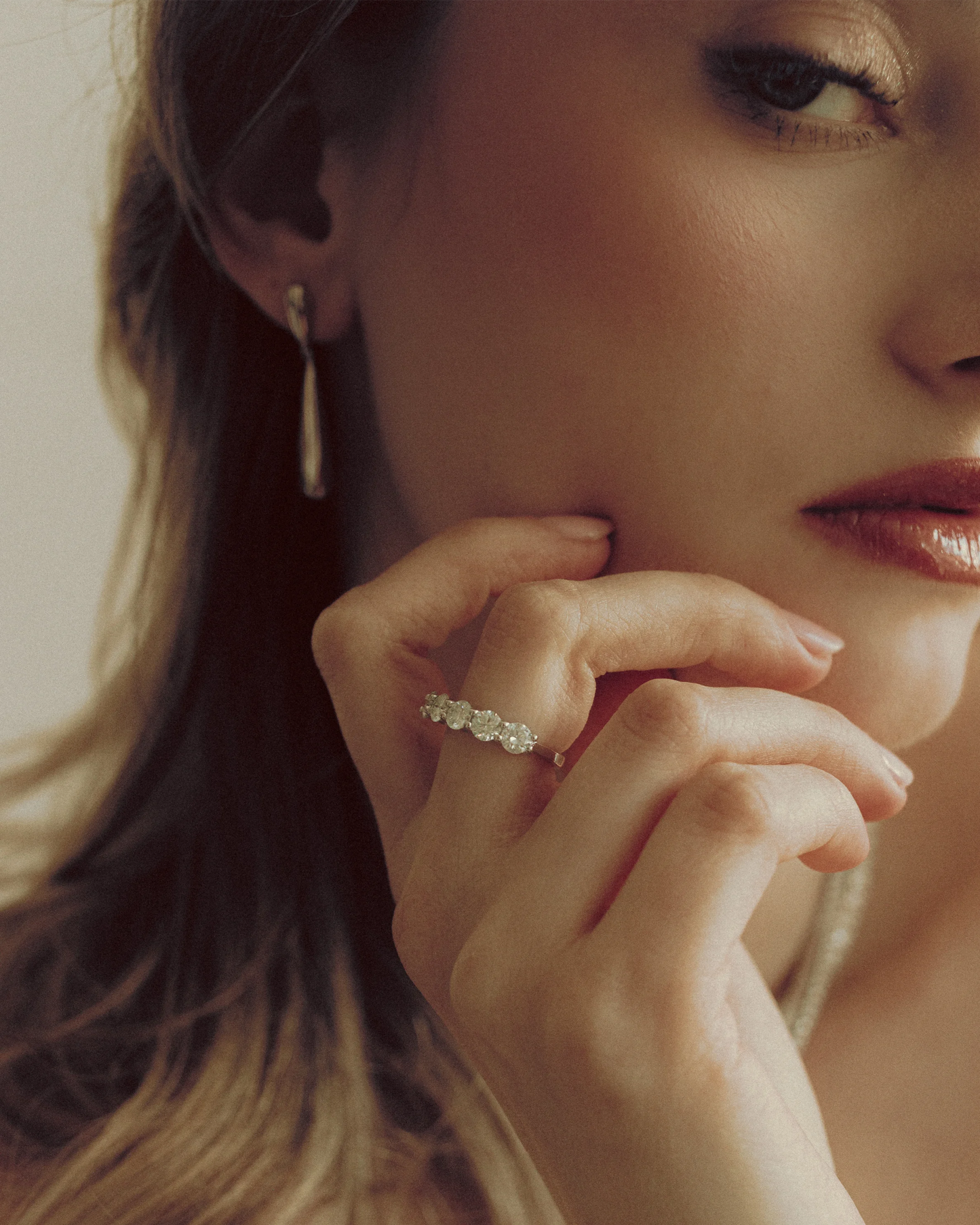 Long Drop Earrings by Goldmacher – 18K gold-plated sculptural earrings worn by model, elongating the neckline