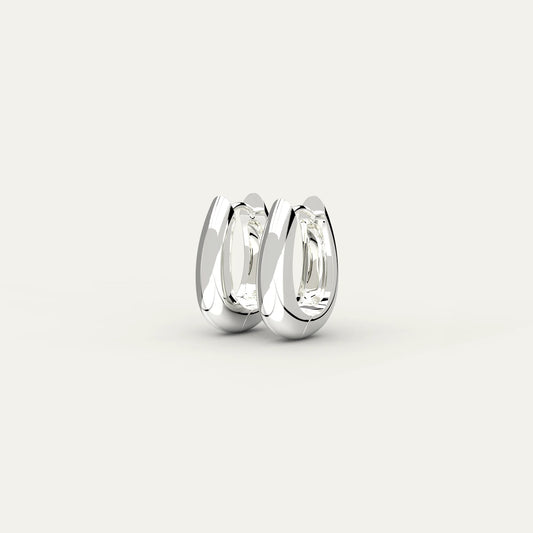 Rhodium Silver Molten Drop Earrings – Smooth Curved Hoop in Sculptural Metallic Form