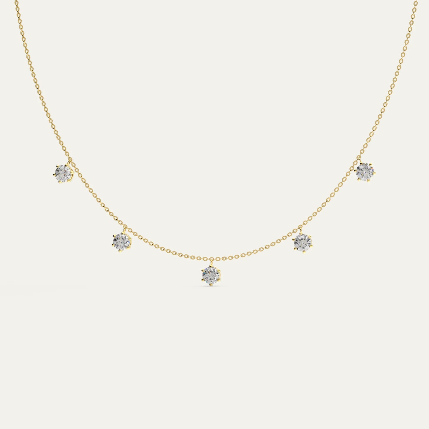 Phoebe 18k gold necklace by Goldmacher featuring five dazzling moissanite stones set in delicate stations