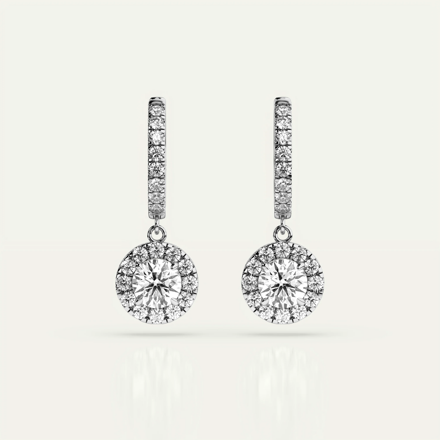 Goldmacher Pollux halo drop earrings with 1ct round moissanite center stone, crafted in 925 sterling silver for elegant occasions