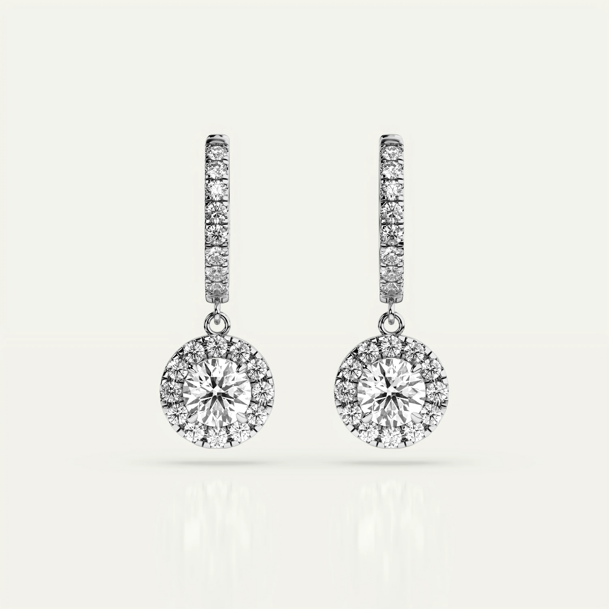 Goldmacher Pollux halo drop earrings with 1ct round moissanite center stone, crafted in 925 sterling silver for elegant occasions