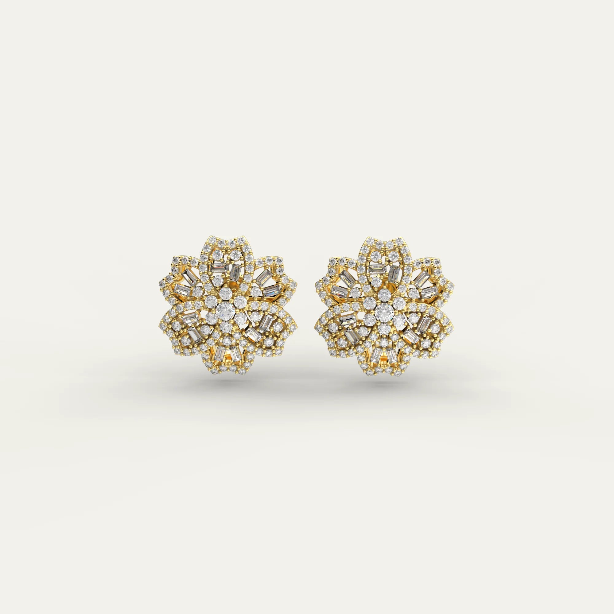 Goldmacher Rosemary floral moissanite cluster earrings in 18k gold with mixed round and baguette cuts