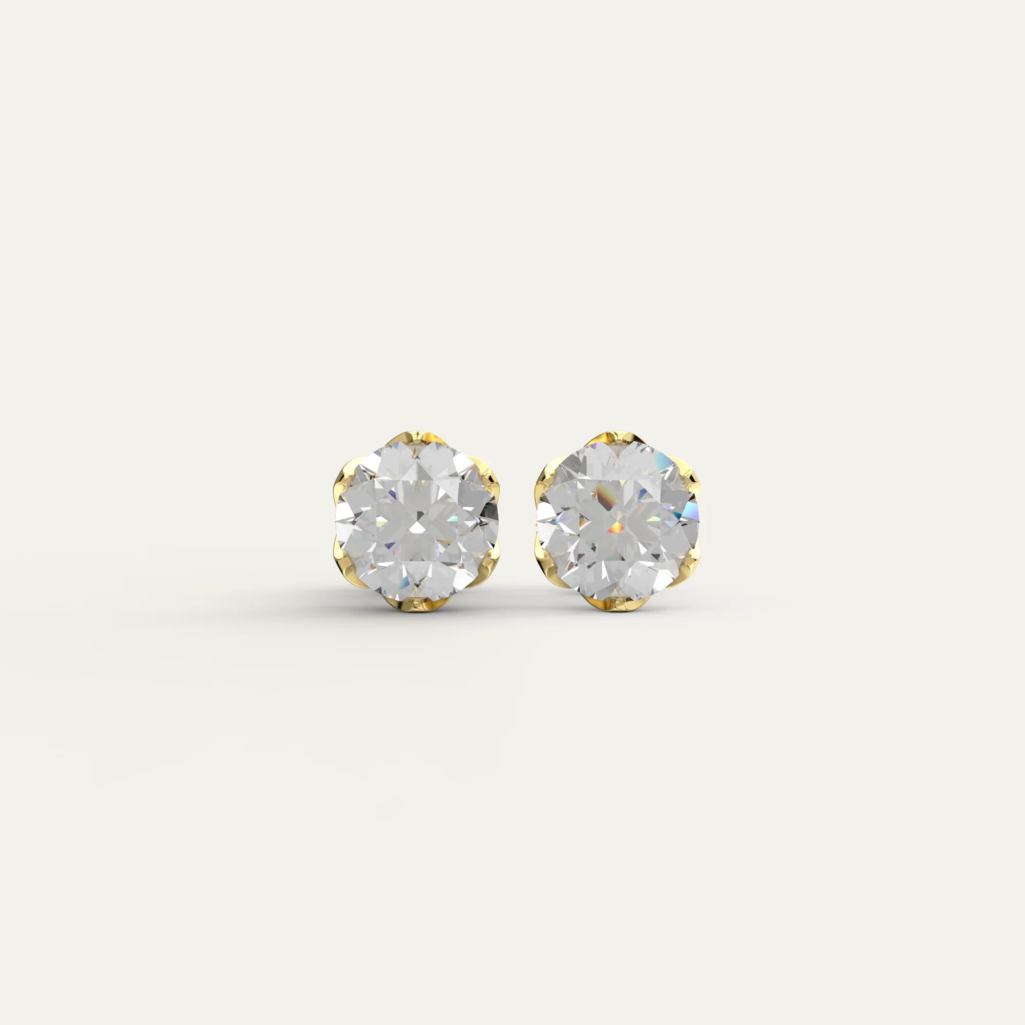 Goldmacher Zenith 1ct 6.5mm round moissanite stud earrings in 18k gold