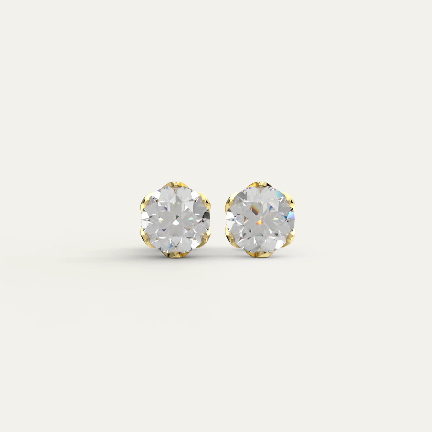 Goldmacher Zenith 1ct 6.5mm round moissanite stud earrings in 18k gold