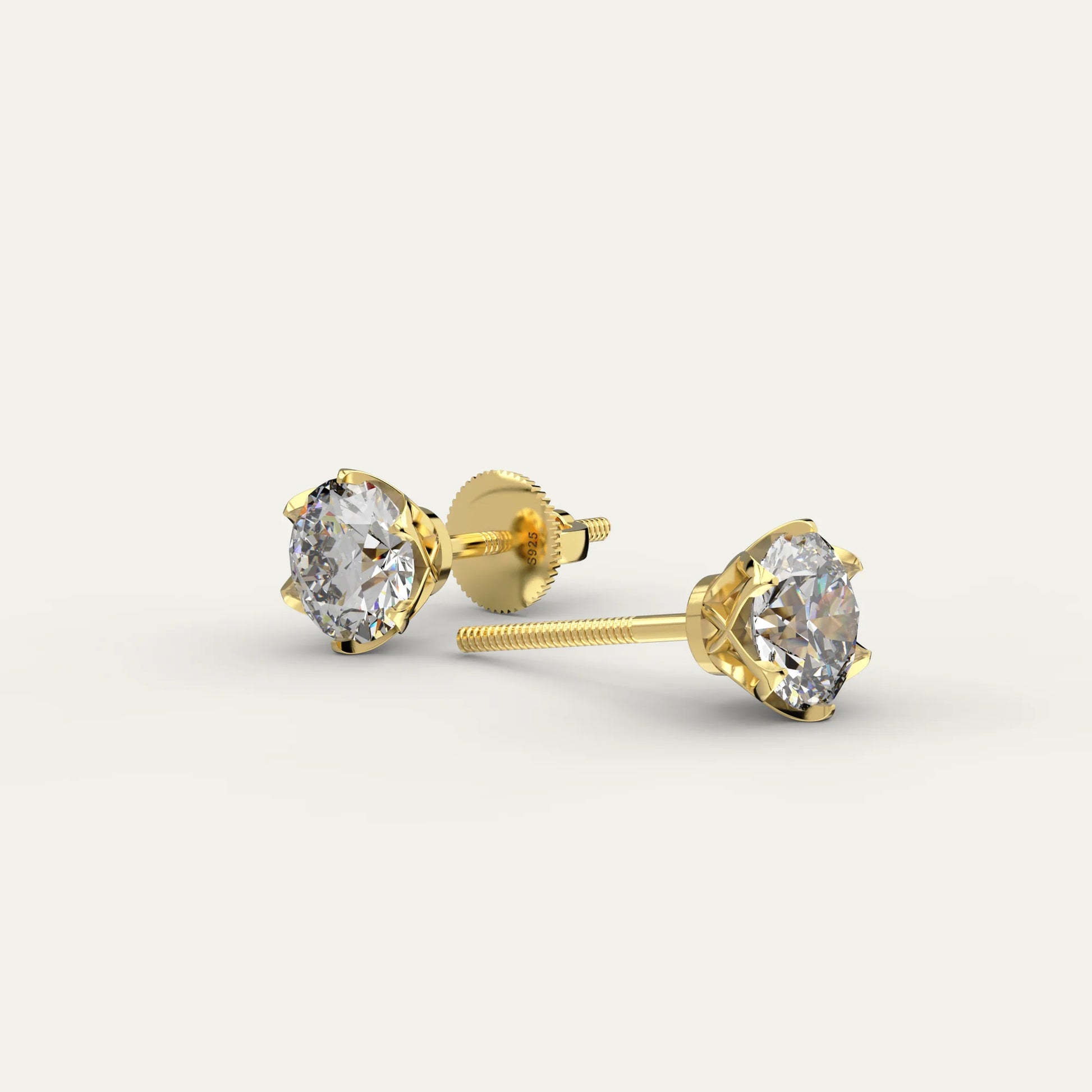 Goldmacher Zenith 1ct 6.5mm Round Moissanite Stud Earrings in 18k Gold-Plated Finish – Timeless Elegance for Everyday Luxury.