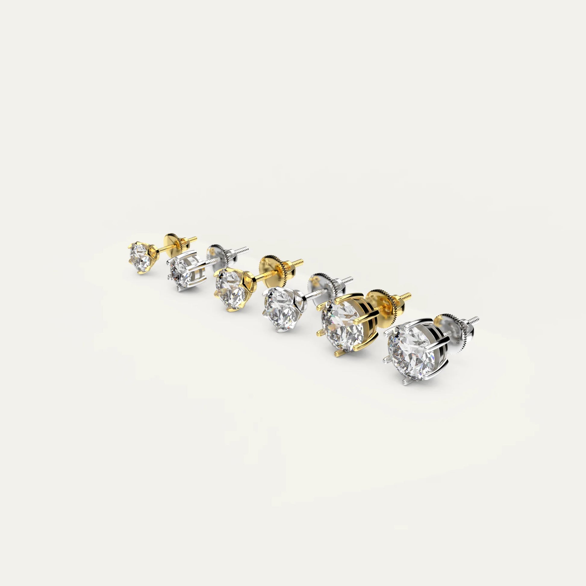Zenith Collection by Goldmacher – Visual guide comparing carat sizes of round moissanite stud earrings in 925 silver and gold settings