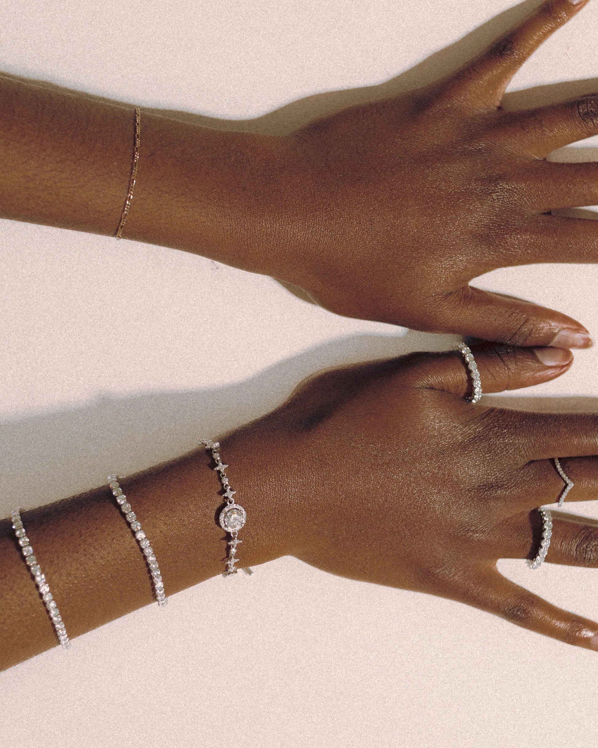  Goldmacher Celeste and Lyric moissanite bracelets styled with a classic moissanite 