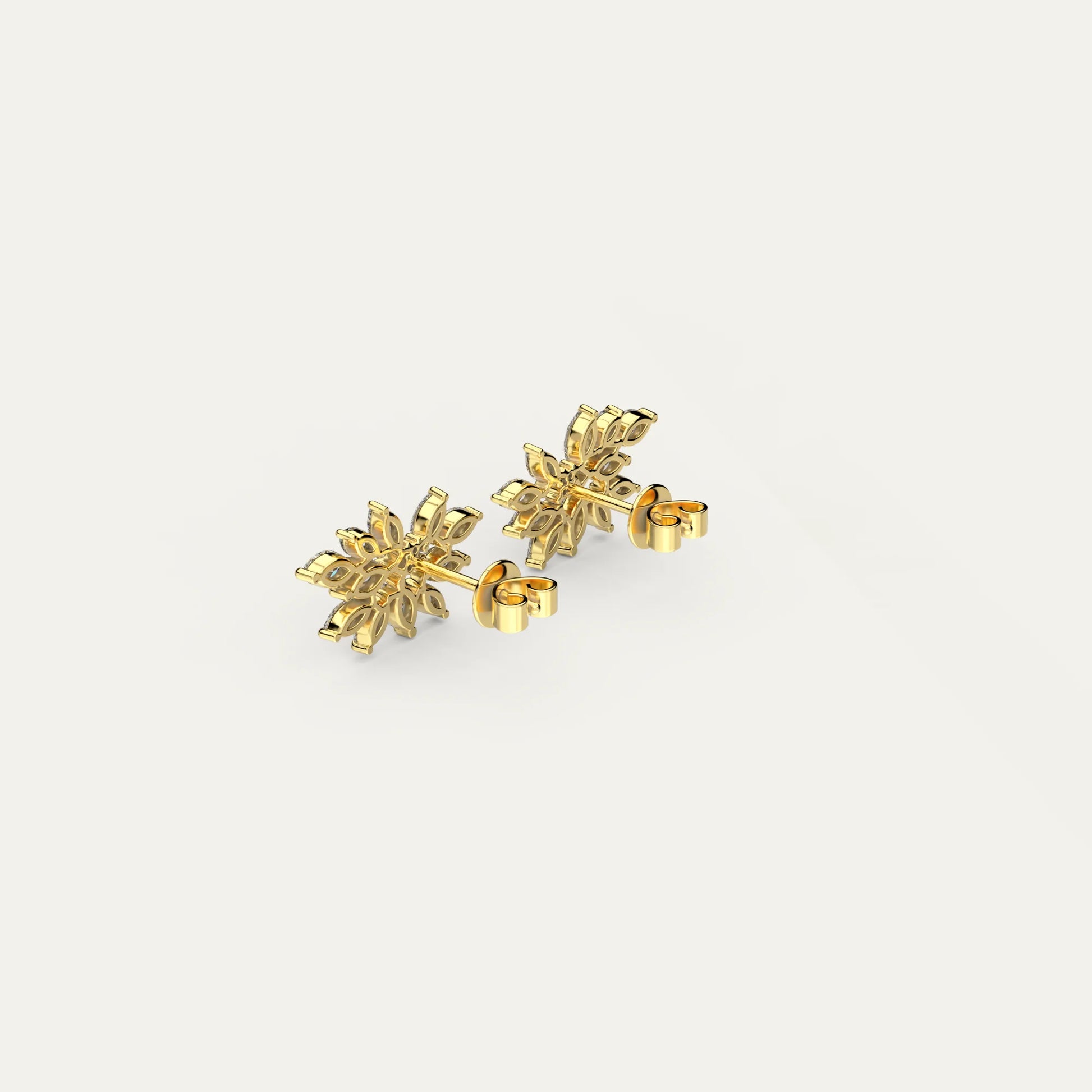 Close-up of Goldmacher Fleur Spark earrings – floral cluster design in gold with brilliant marquise zircons