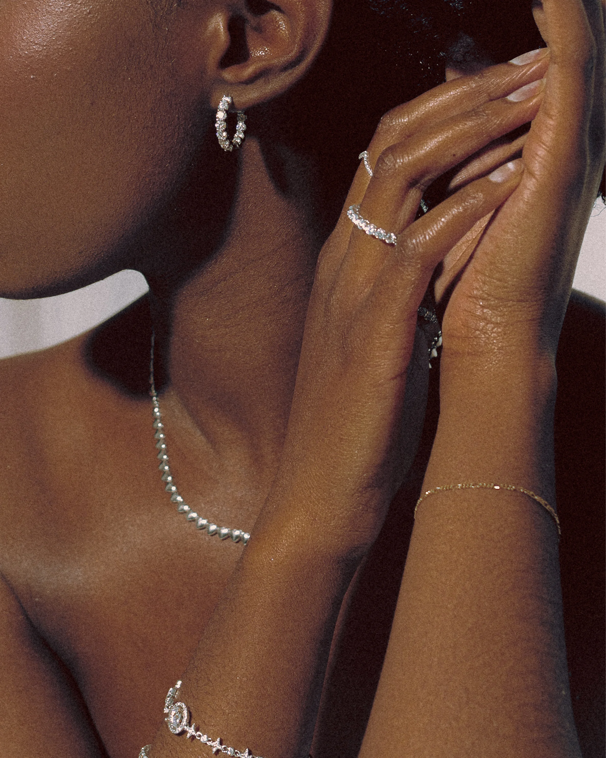 Modern styling of Goldmacher moissanite hoop earrings