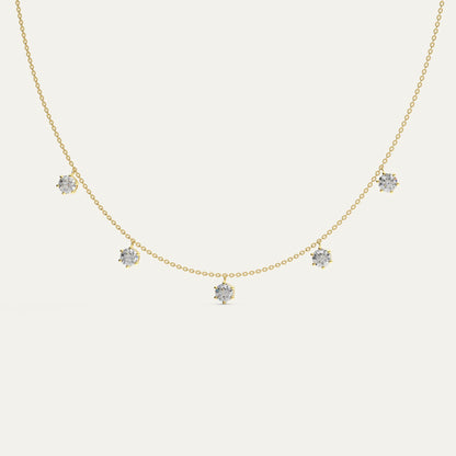Phoebe 18k gold necklace by Goldmacher featuring five dazzling moissanite stones set in delicate stations