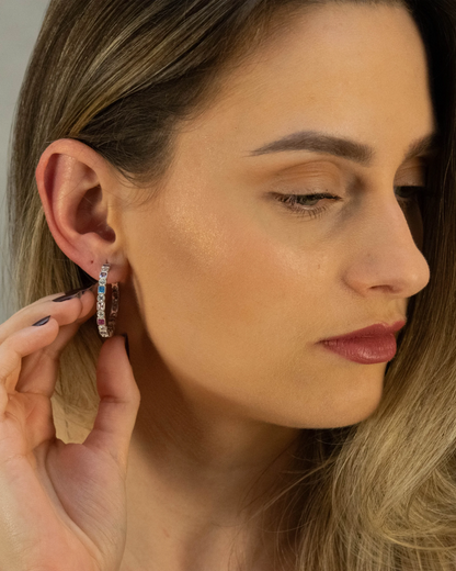  Model wearing Goldmacher Prism Loop Earrings in 925 silver with colorful round and square zircon stones