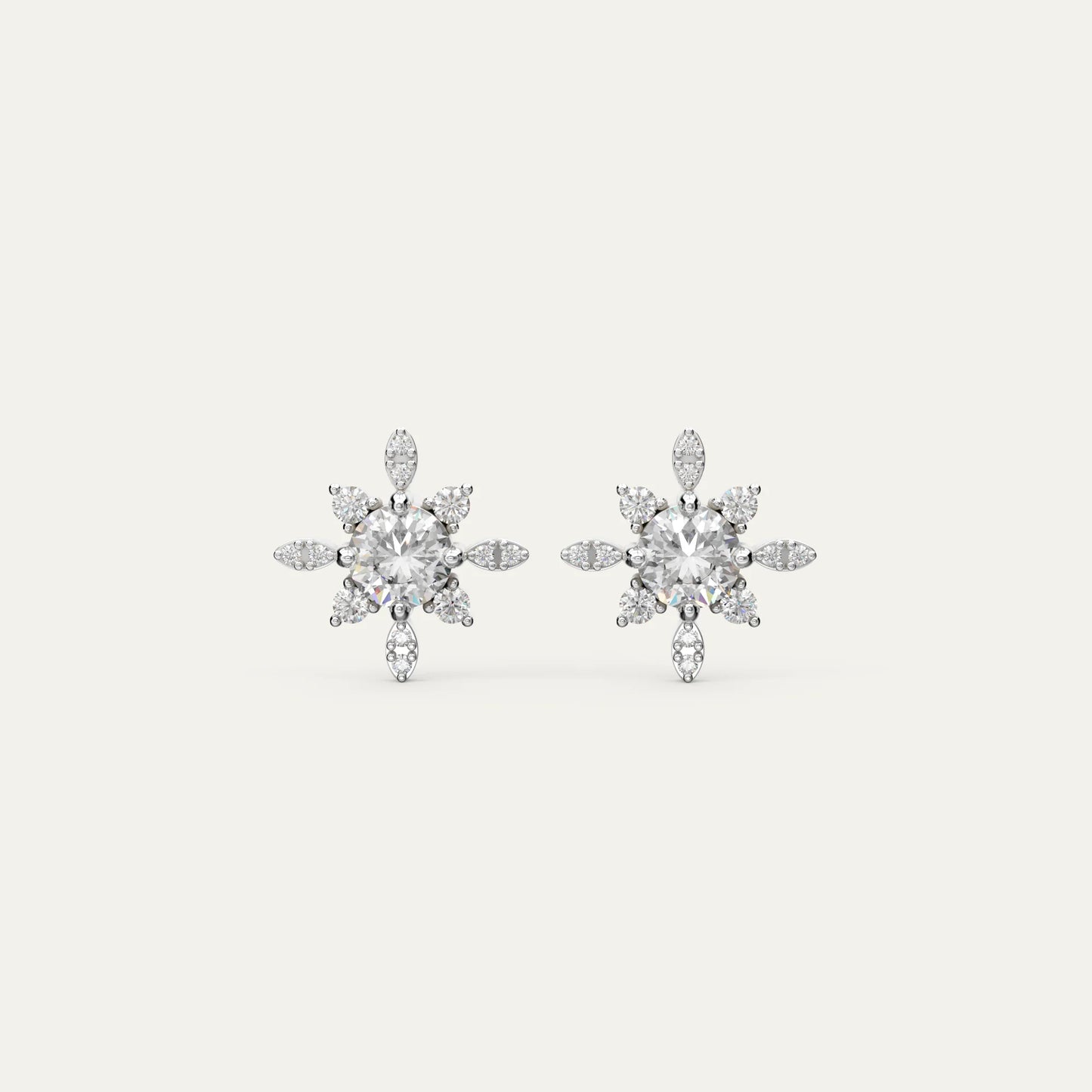 Goldmacher Vega star-shaped moissanite stud earrings in 925 silver with a round center stone