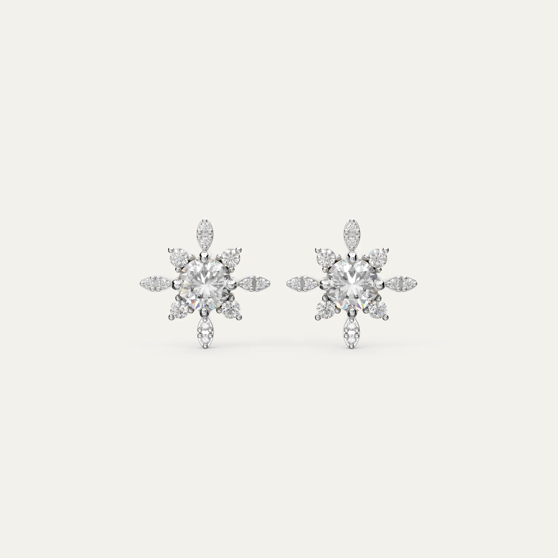 Goldmacher Vega star-shaped moissanite stud earrings in 925 silver with a round center stone