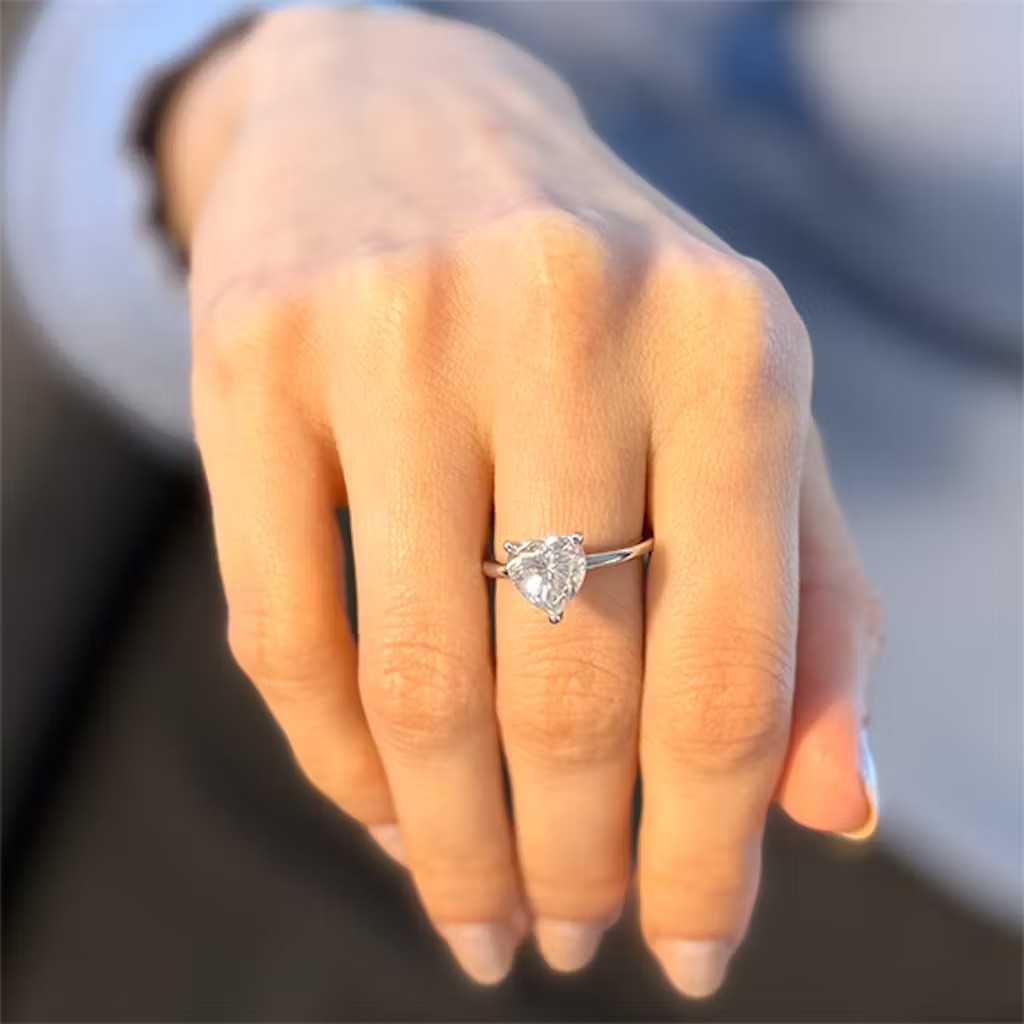 Customer wearing Goldmacher Elora moissanite ring